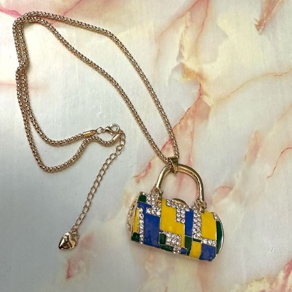 Betsey Johnson Jewelry - Betsey Johnson gold tone enamel bag pendant necklace